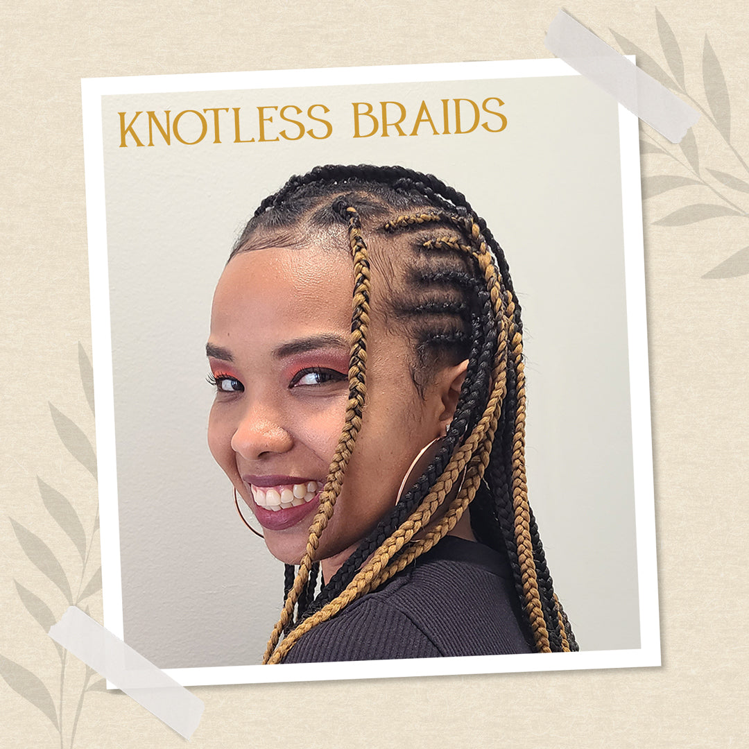 Girl wearing knotless braids.